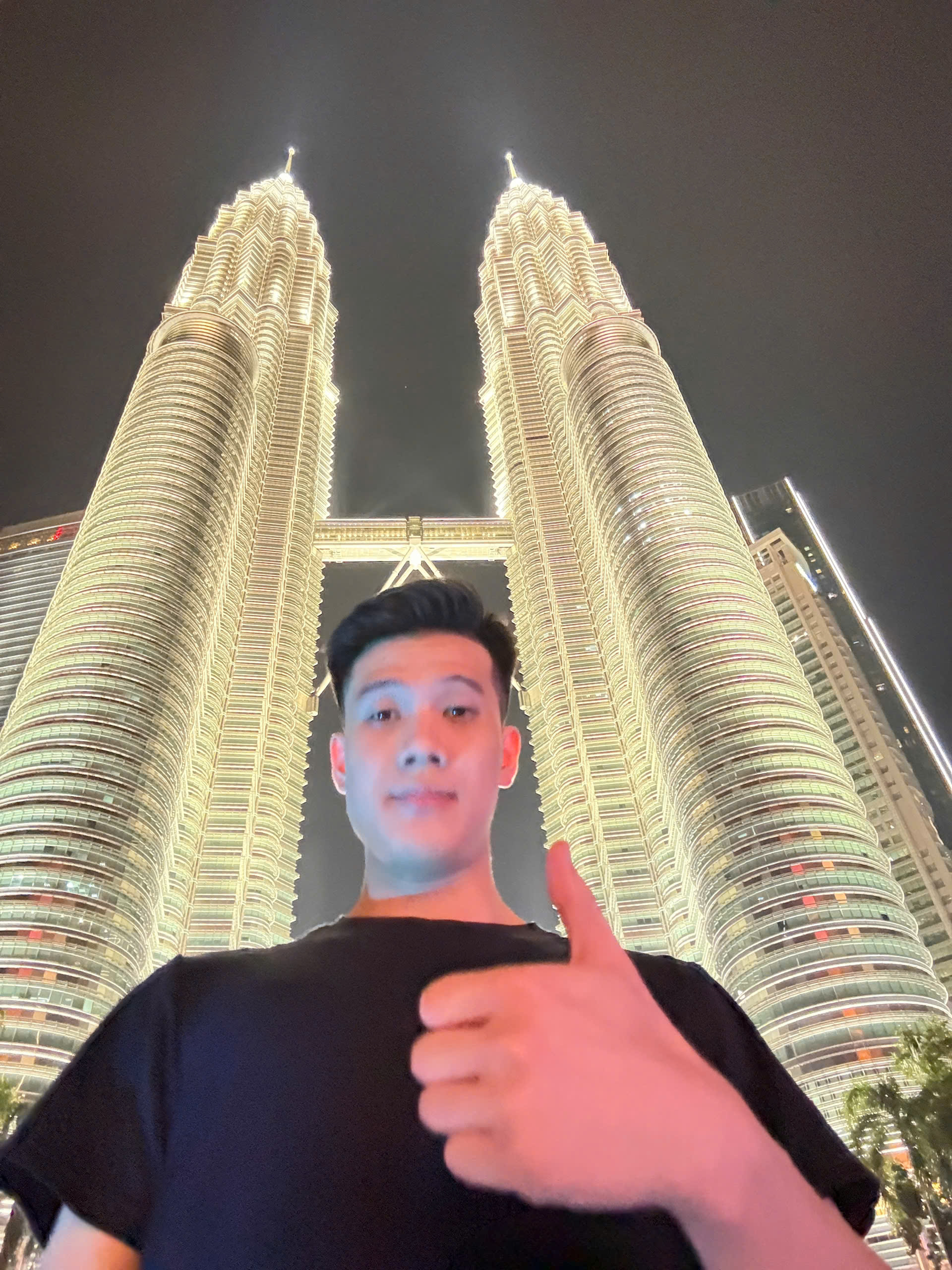Dong beside the Kuala Lumpur skyline
